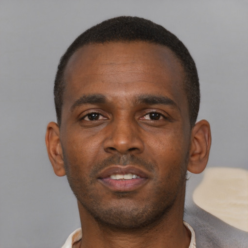 Neutral black young-adult male with short  brown hair and brown eyes