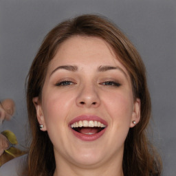 Joyful white adult female with medium  brown hair and grey eyes