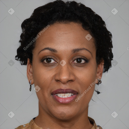 Joyful black adult female with short  brown hair and brown eyes