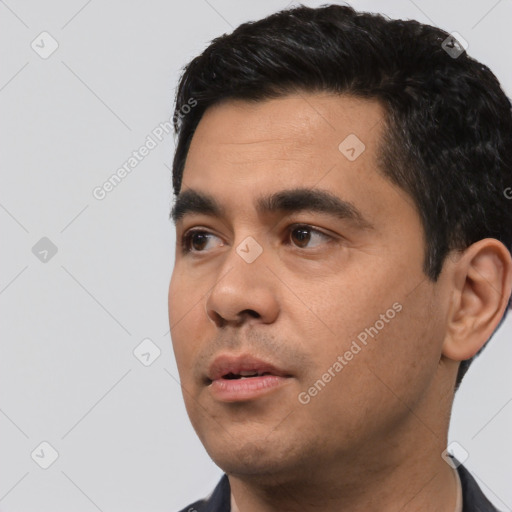 Neutral latino young-adult male with short  black hair and brown eyes