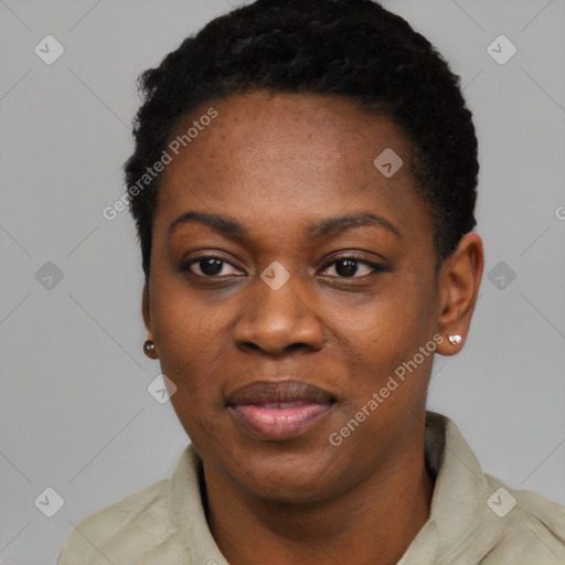 Joyful black young-adult female with short  black hair and brown eyes