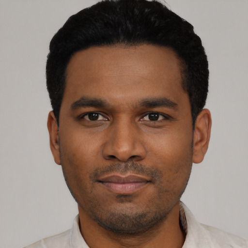 Neutral latino young-adult male with short  black hair and brown eyes