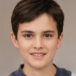 Joyful white child male with short  brown hair and brown eyes