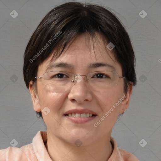 Joyful white adult female with short  brown hair and brown eyes