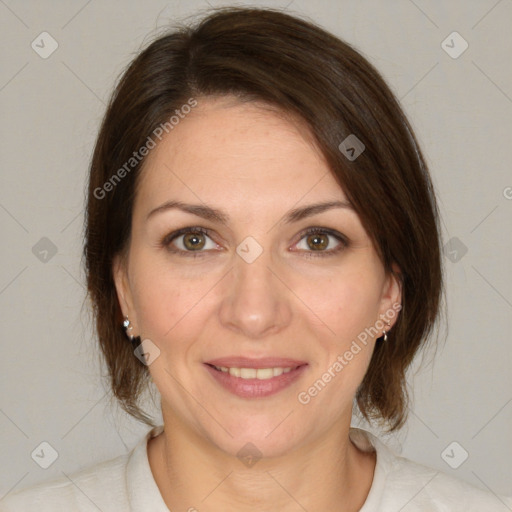 Joyful white adult female with medium  brown hair and brown eyes