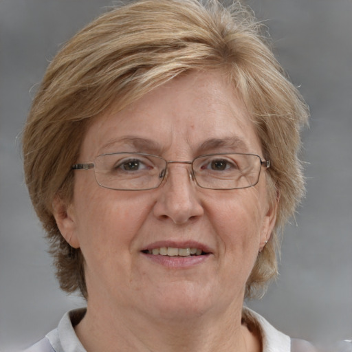 Joyful white middle-aged female with medium  brown hair and blue eyes