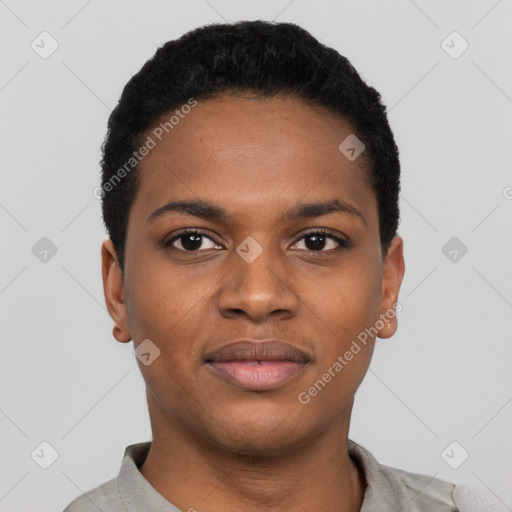 Joyful black young-adult male with short  black hair and brown eyes