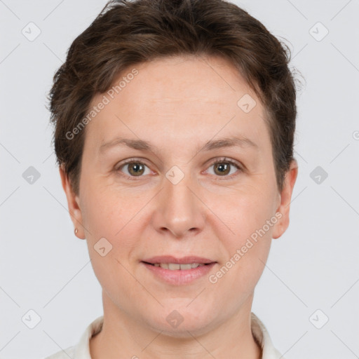 Joyful white adult female with short  brown hair and brown eyes