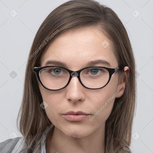 Neutral white young-adult female with medium  brown hair and grey eyes