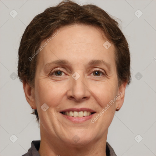 Joyful white adult female with short  brown hair and brown eyes