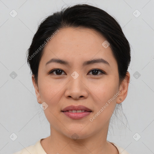 Joyful asian young-adult female with medium  brown hair and brown eyes