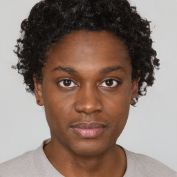 Neutral black young-adult male with short  brown hair and brown eyes