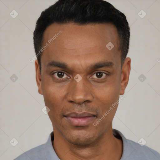 Neutral black young-adult male with short  black hair and brown eyes