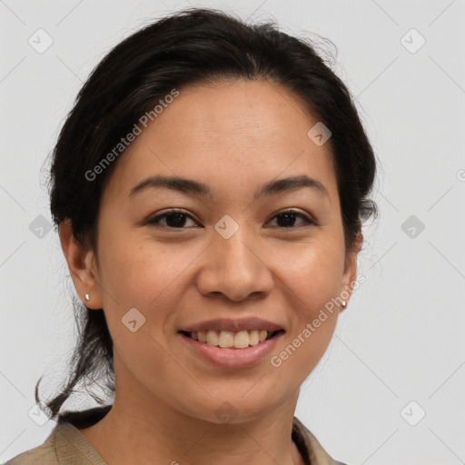 Joyful latino young-adult female with medium  brown hair and brown eyes