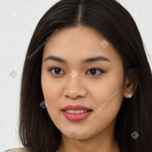 Joyful asian young-adult female with long  brown hair and brown eyes