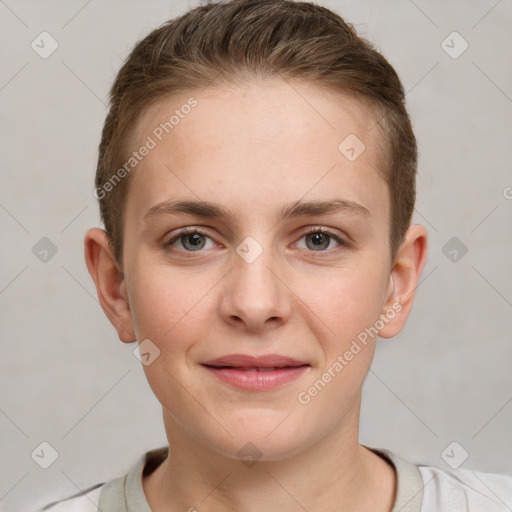 Joyful white young-adult female with short  brown hair and grey eyes