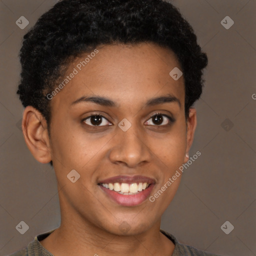 Joyful black young-adult female with short  brown hair and brown eyes