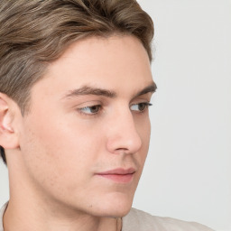 Neutral white young-adult male with short  brown hair and grey eyes