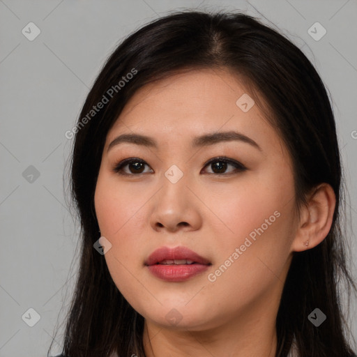 Joyful asian young-adult female with long  brown hair and brown eyes