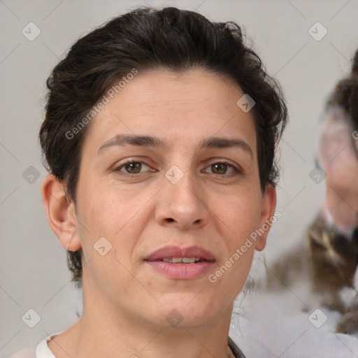 Joyful white adult female with short  brown hair and brown eyes