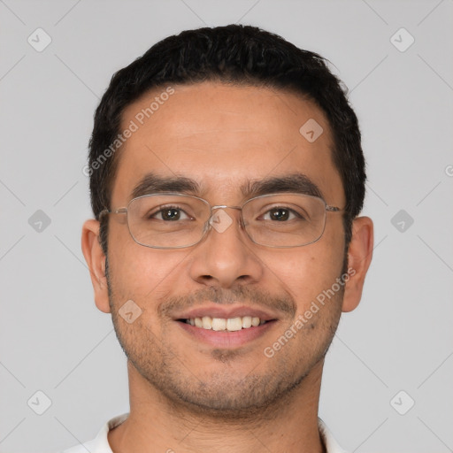 Joyful white young-adult male with short  black hair and brown eyes