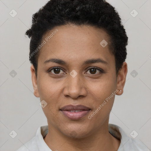 Joyful black young-adult female with short  black hair and brown eyes