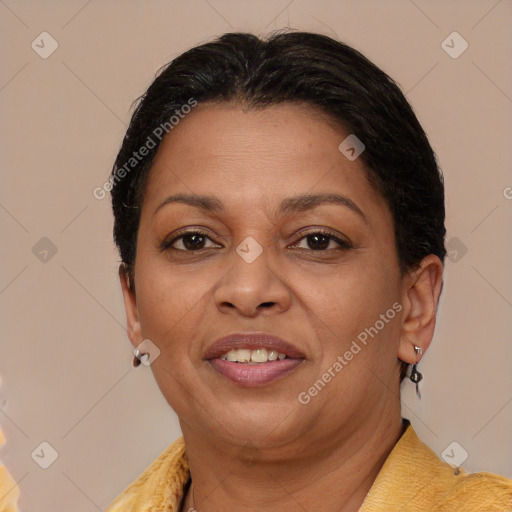 Joyful black adult female with short  brown hair and brown eyes