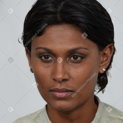 Neutral black young-adult female with short  brown hair and brown eyes