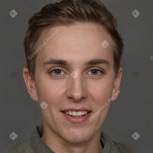 Joyful white adult male with short  brown hair and grey eyes