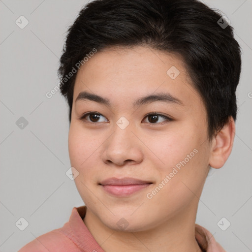 Joyful asian young-adult female with short  brown hair and brown eyes