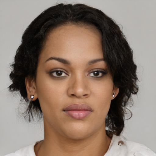 Neutral black young-adult female with medium  black hair and brown eyes