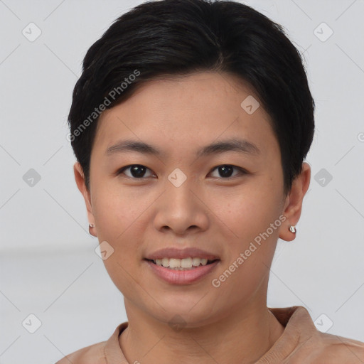 Joyful asian young-adult female with short  black hair and brown eyes