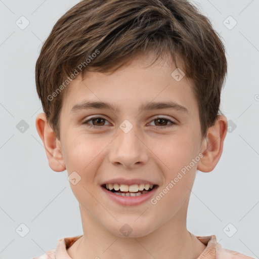 Joyful white child male with short  brown hair and brown eyes