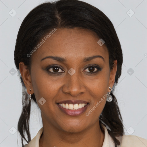 Joyful black young-adult female with medium  brown hair and brown eyes