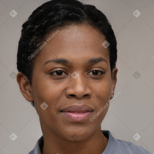 Joyful black young-adult female with short  black hair and brown eyes