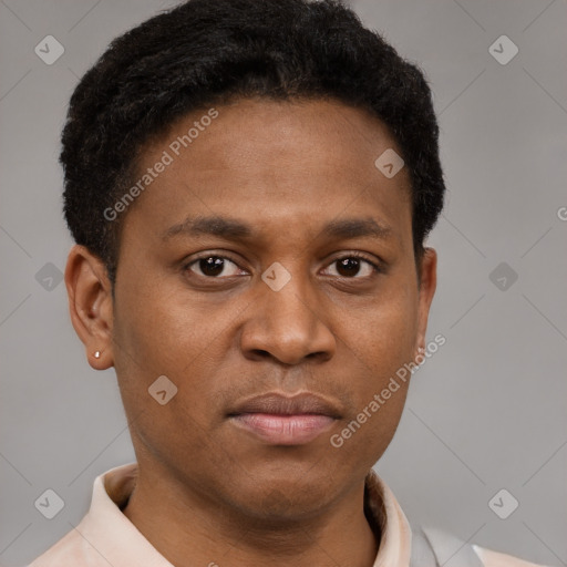 Neutral latino young-adult male with short  brown hair and brown eyes