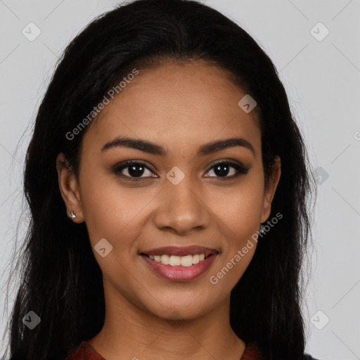 Joyful latino young-adult female with long  black hair and brown eyes