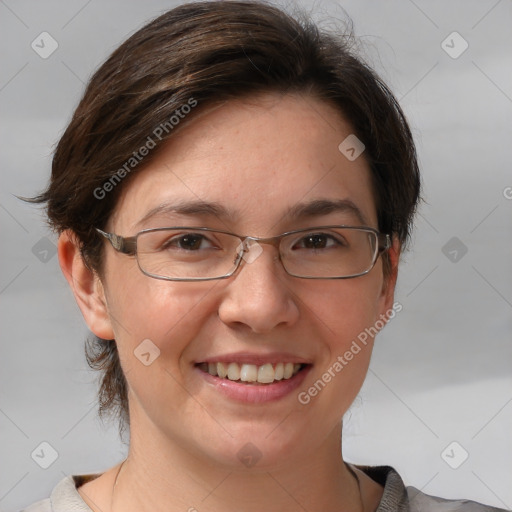 Joyful white adult female with medium  brown hair and brown eyes