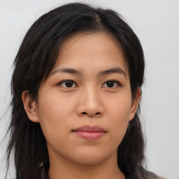 Neutral asian young-adult female with medium  brown hair and brown eyes