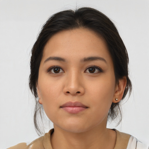 Neutral asian young-adult female with medium  brown hair and brown eyes