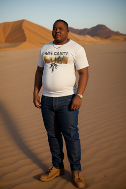 Jamaican young adult male with  blonde hair