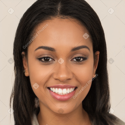 Joyful latino young-adult female with long  brown hair and brown eyes