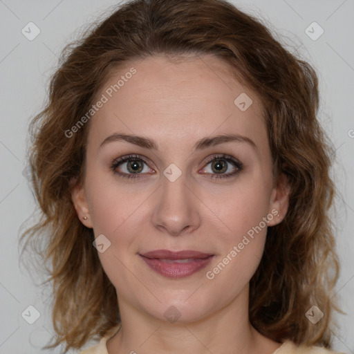 Joyful white young-adult female with medium  brown hair and green eyes