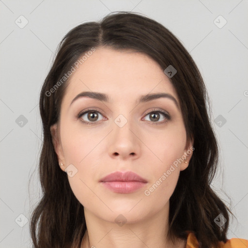 Neutral white young-adult female with long  brown hair and brown eyes