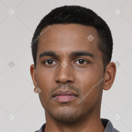 Neutral black young-adult male with short  black hair and brown eyes