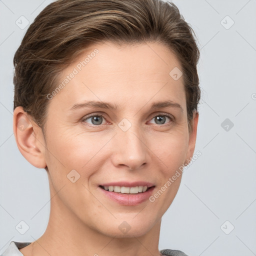 Joyful white young-adult female with short  brown hair and grey eyes