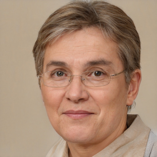 Joyful white middle-aged female with short  brown hair and brown eyes