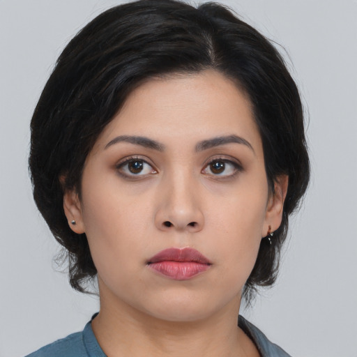 Neutral asian young-adult female with medium  black hair and brown eyes