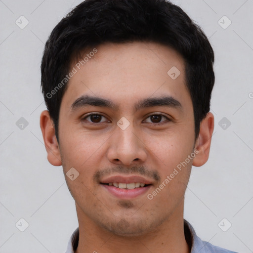 Joyful white young-adult male with short  black hair and brown eyes