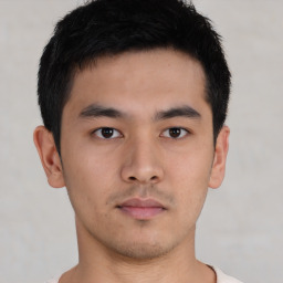 Neutral asian young-adult male with short  black hair and brown eyes